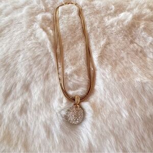Elegant Gold Necklace with Crystal Pendant